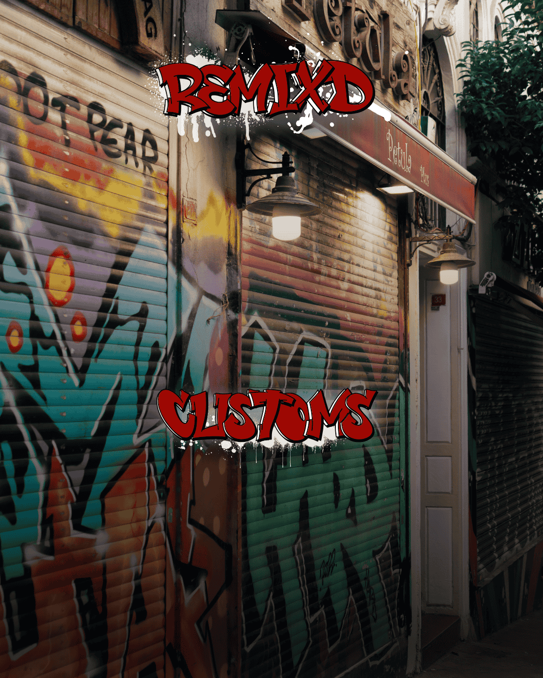 Graffiti-covered city alley wall with bold “Remix’d Customs” street art text, representing custom apparel and print design services.
